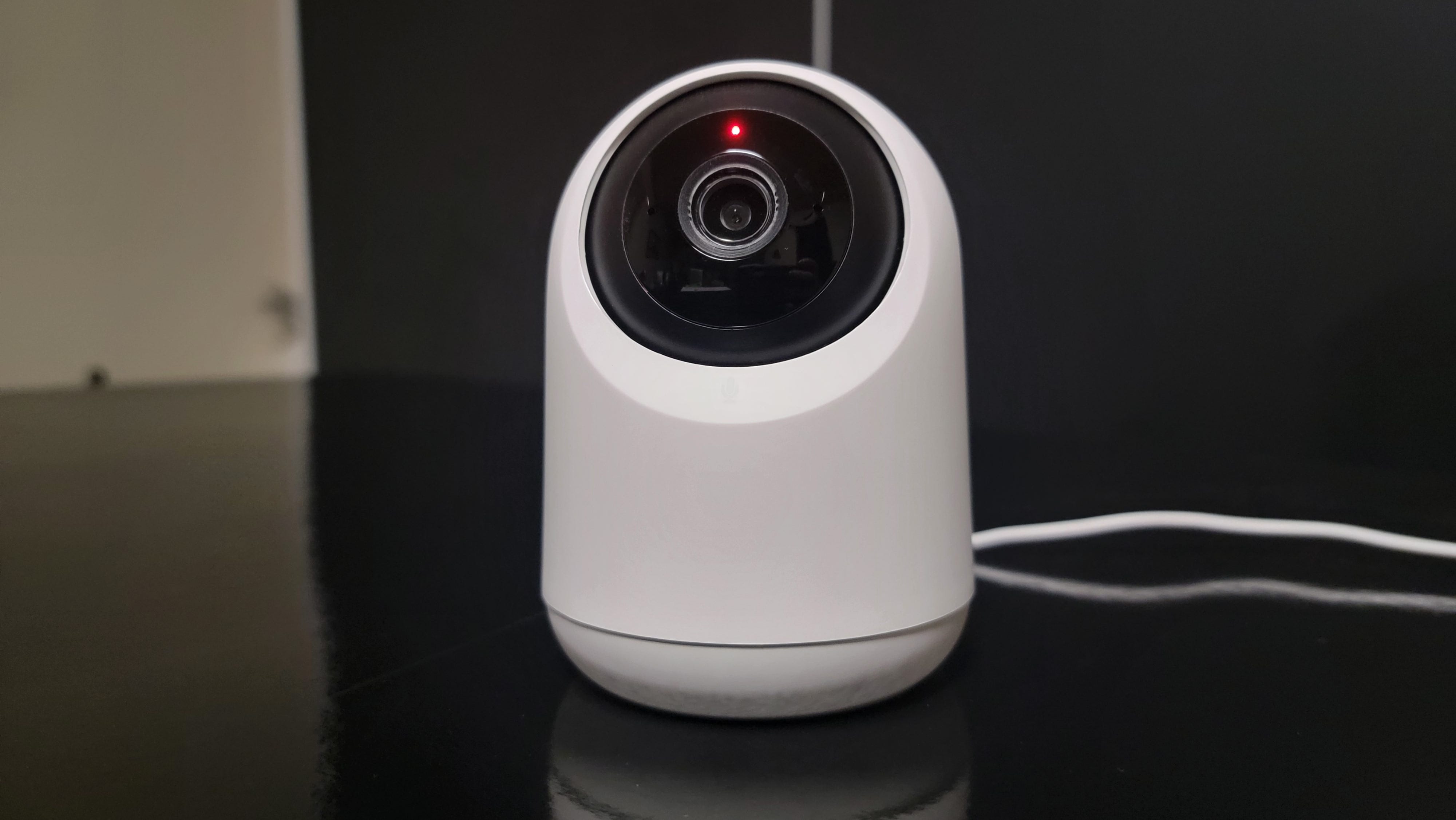 SwitchBot Pan Tilt camera with red light indicating Privacy Mode