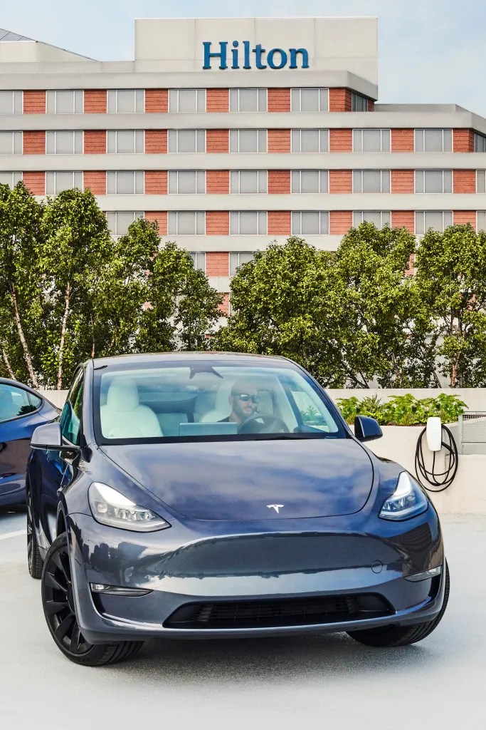 Hilton will install 20,000 Tesla chargers at its hotels to attract EV owners
