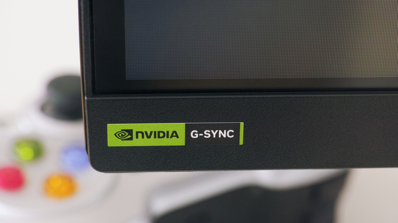 Nvidia G-Sync logo on corner of monitor.
