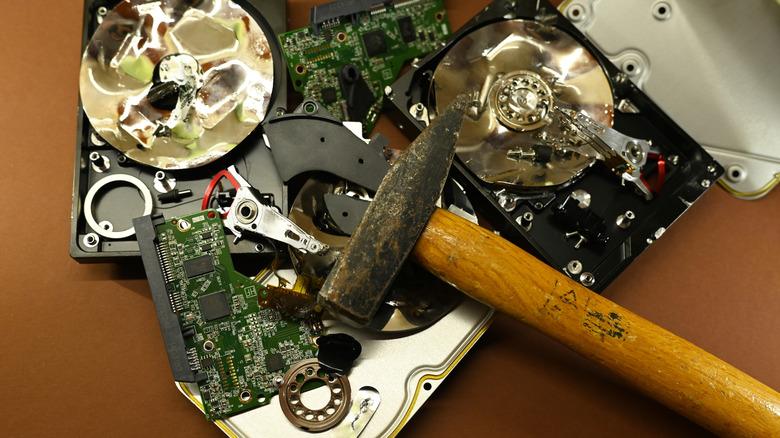 Physically destroying hard drives with a hammer.