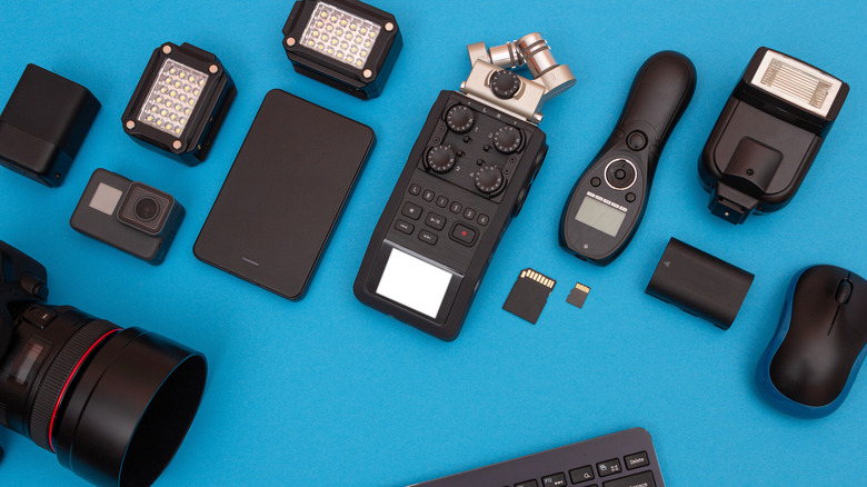 Various tech gadgets displayed on a blue background