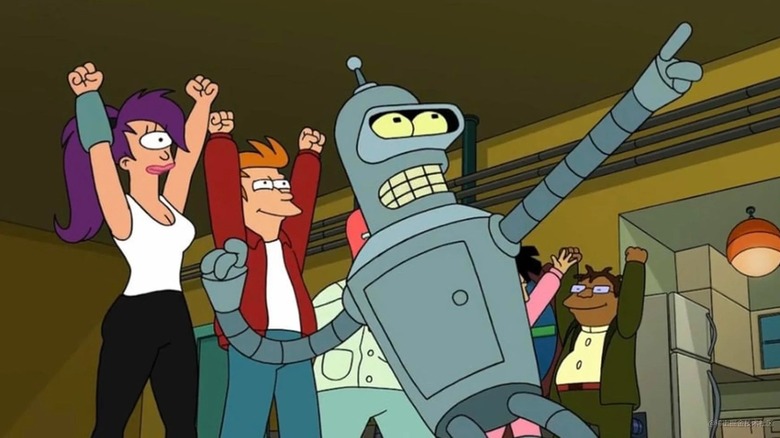 Bender pointing at something, Leela, Fry and Hermese cheering behind him in 'Futurama.'