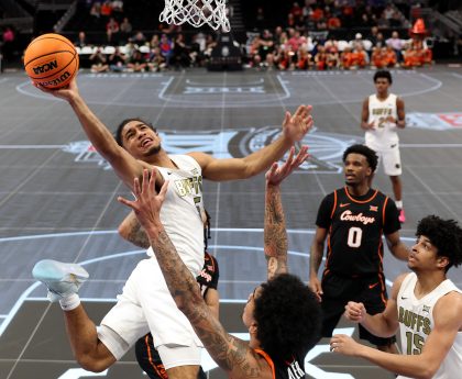 Big 12 Basketball Tournament Replaces Slippery LED Courts with Hardwood