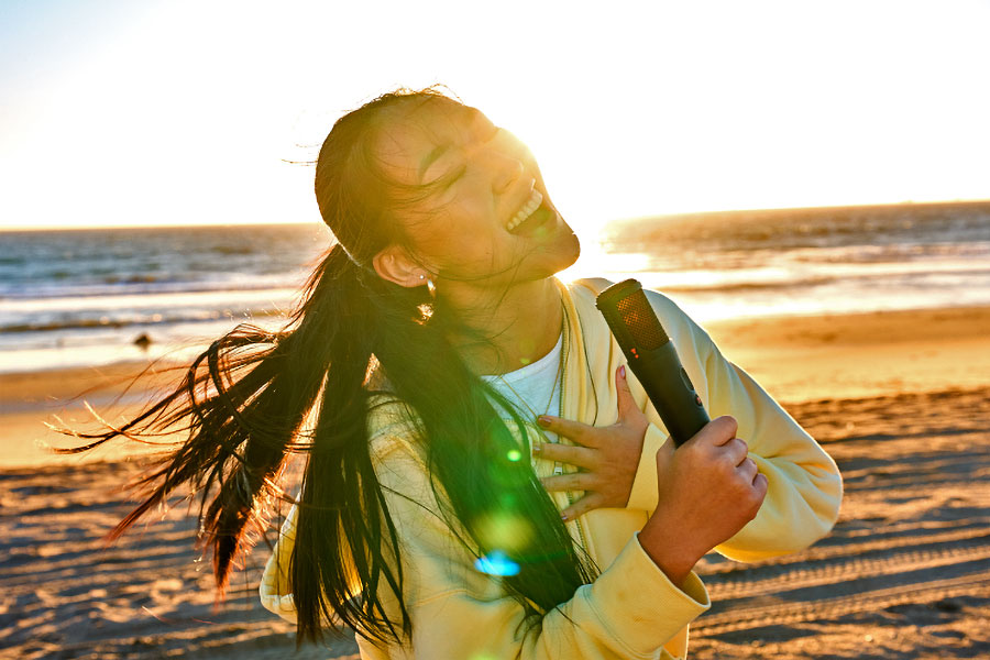 JBL's New Party Speaker Includes a Karaoke Mic to Help You Hit High Notes