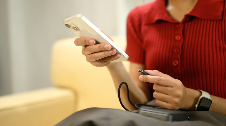 Refrain from charging a power bank while it is in operation unless it is designed to support pass-through charging.