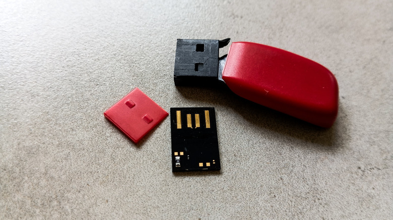 USB flash drive lying on a surface