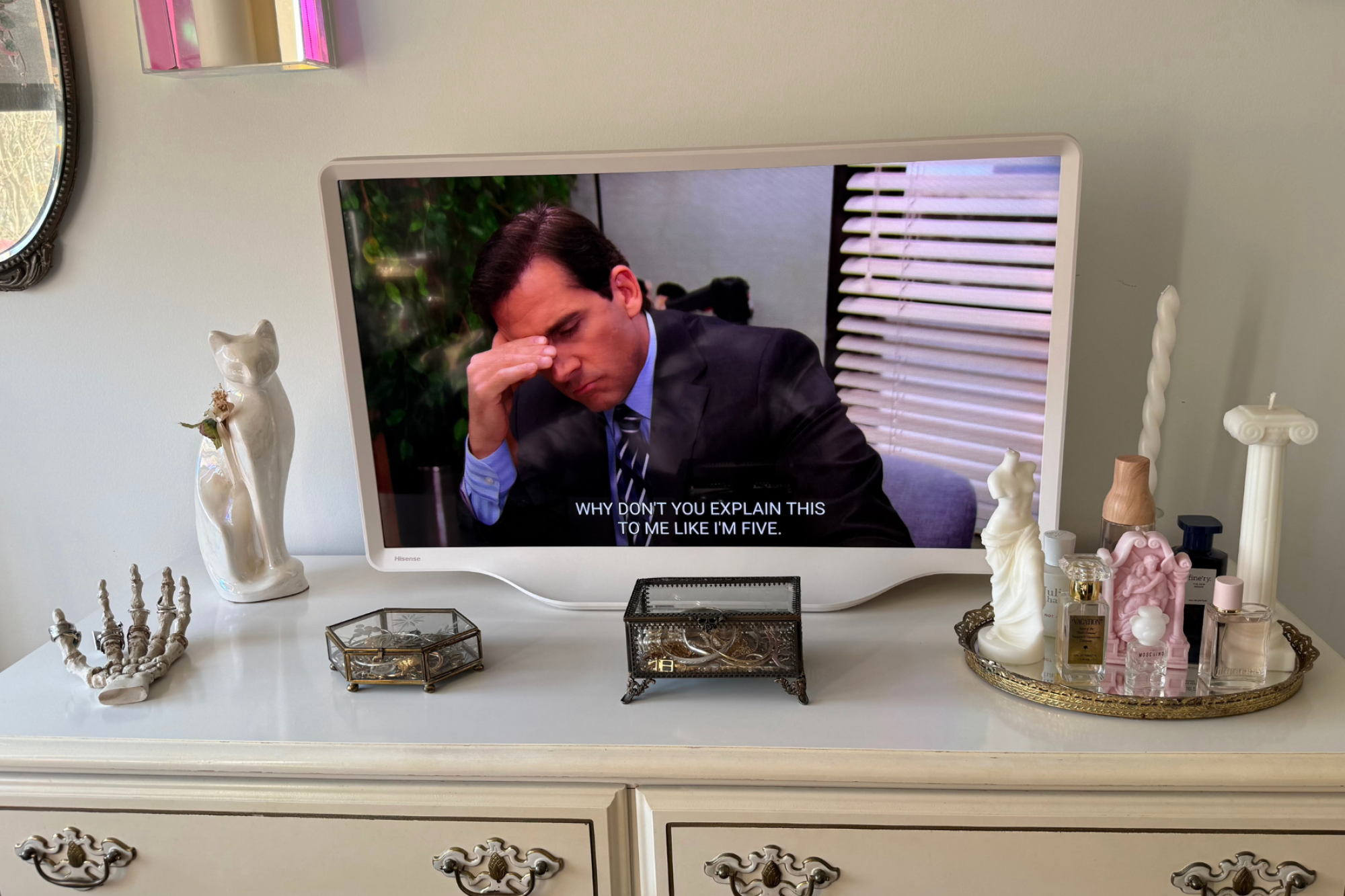 Hisense Déco TV sitting on dresser while playing a scene from 'The Office'