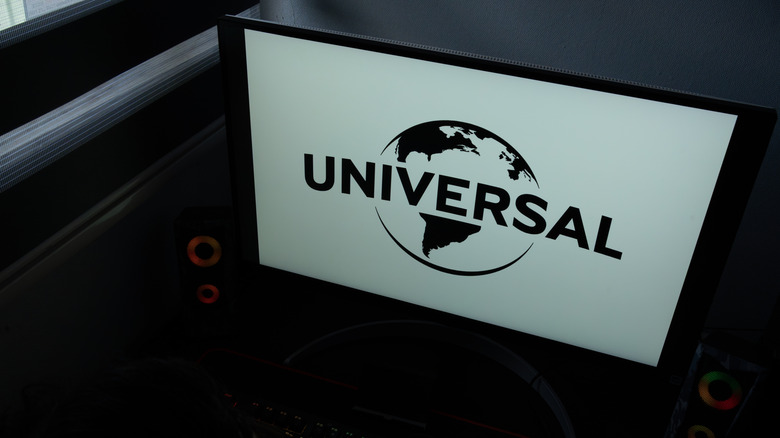 The corporate logo and globe icon of Universal Pictures displayed on a computer monitor