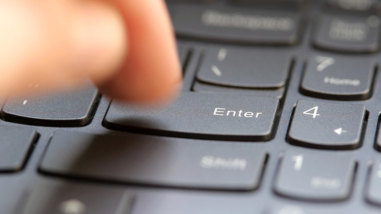 Close-up view of an ANSI style Enter key, which is elongated and horizontal