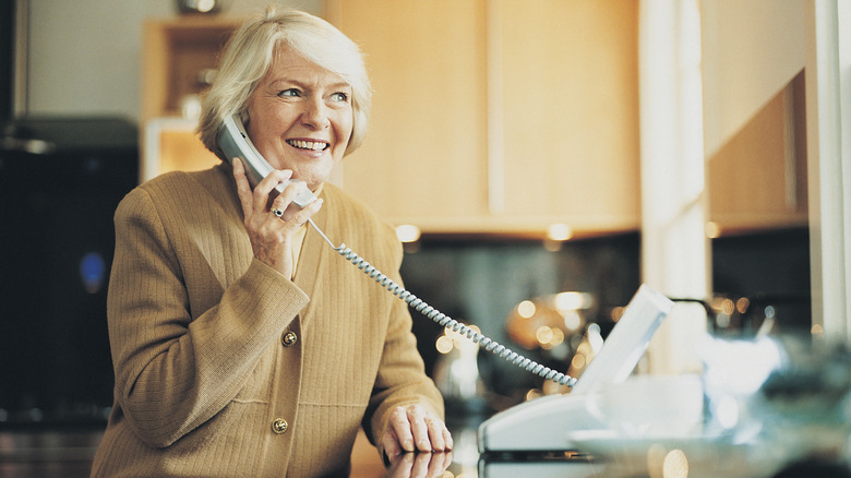The Explanation for Coiled Wires on Landline Telephones Rather than Straight