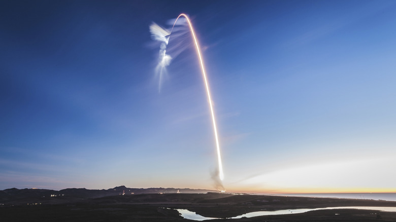 The Explanation for Why Rockets Trace a Curved Path Rather Than Ascending Vertically During Launch